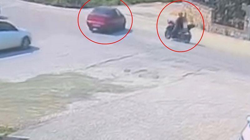Otomobil ile çarpışan motosikletin sürücüsü yaralandı; kaza anı kamerada