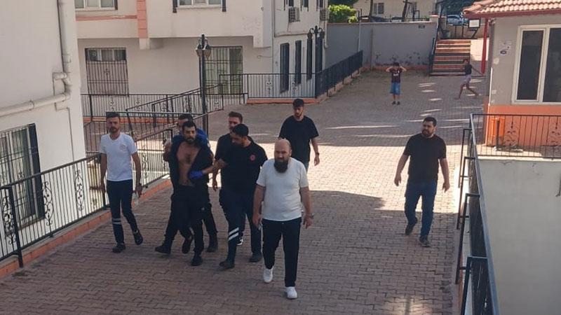 Hamile eşi ile üvey çocuklarını darbetti